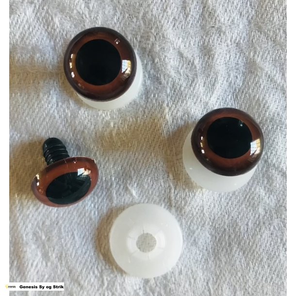 Brunt je med sort pupil