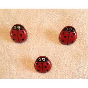 Knap med Mariehne som motiv