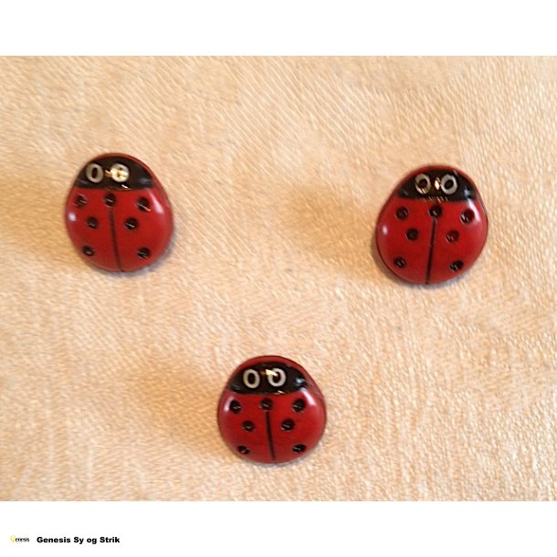 Knap med Mariehne som motiv