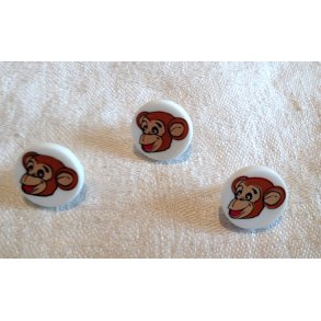 Knap med Abe som motiv