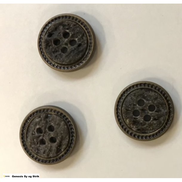 Knap udfrt i metal og med mnster