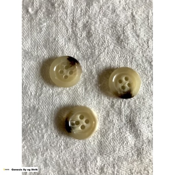 Lys knap med brune aftegninger