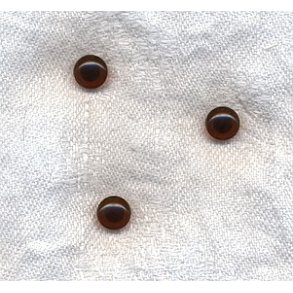 Brunt je med sort pupil