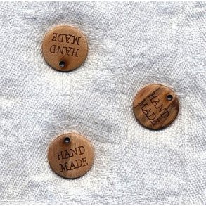 Knap med tekst: HANDMADE