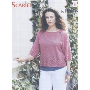 Raglanbluse med hulmnster nederst